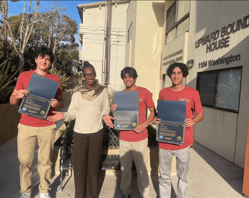 FeelingFullLA volunteers with awards at Upward Bound House